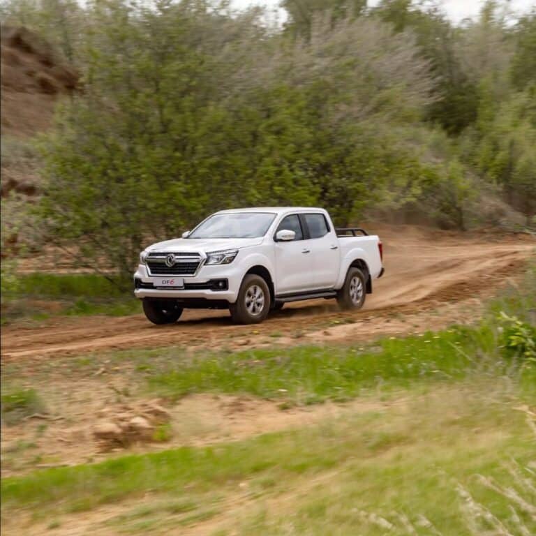 Dongfeng DF6 pickup on dirt road in motion