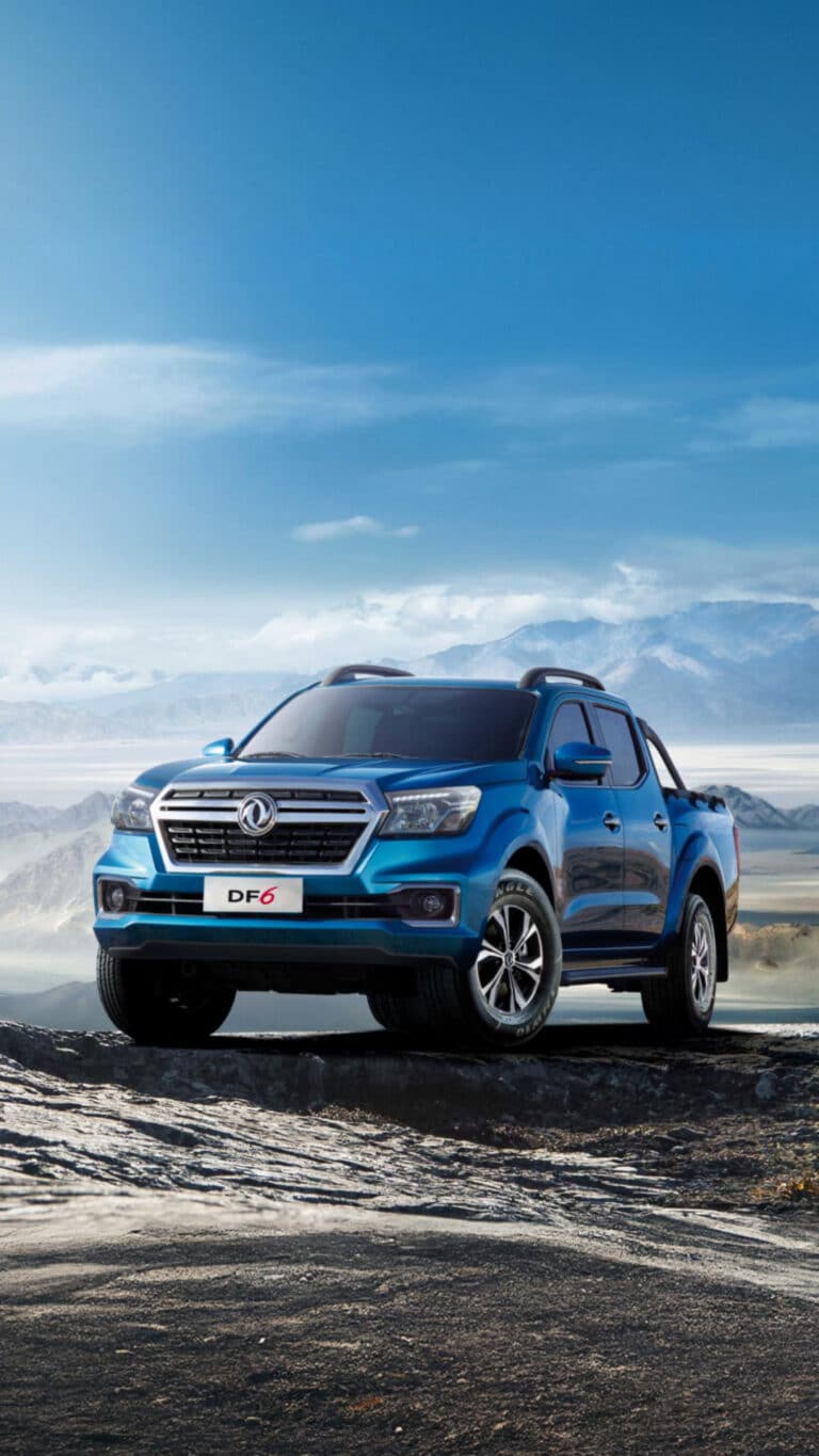 Reliable Dongfeng DF6 SUV against mountain backdrop