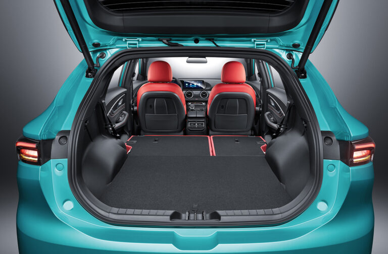 View of T5 EVO cargo compartment with folded rear seats and red front seats