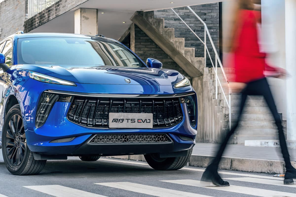 Blue Forthing T5 EVO on pedestrian crossing with emphasis on stylish front design